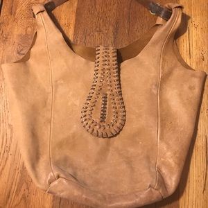 Raw edge leather hobo.